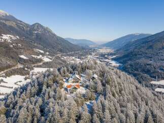 Nestled amidst the snow-kissed peaks, this stunning property offers unparalleled views and a serene escape.