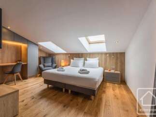 Discover the epitome of comfort and style in this stunning bedroom.