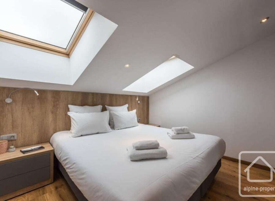 Discover a luxurious bedroom with a modern design.