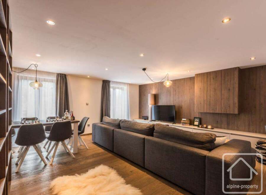 Experience luxury living in this stunning property, featuring a spacious living area with a modern design.
