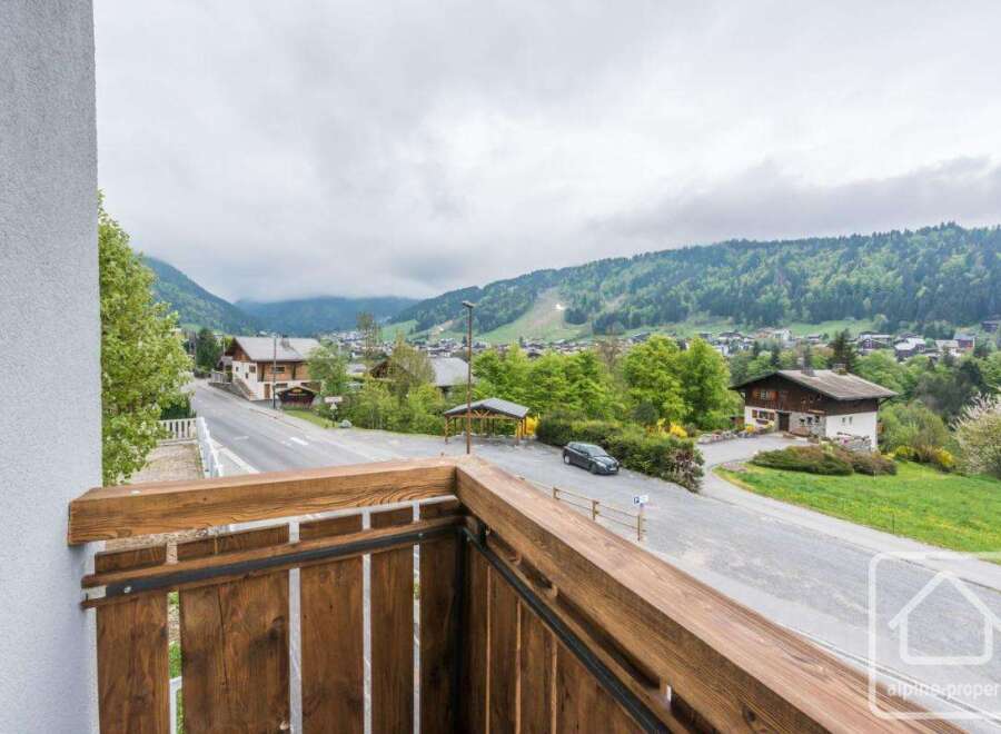 Enjoy breathtaking mountain views from this charming property.