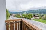 Enjoy breathtaking mountain views from this charming property.