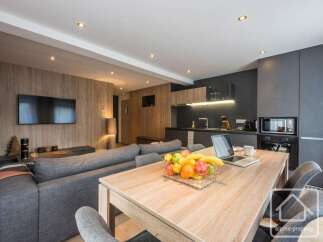 Discover modern living in this stylish property, featuring a seamlessly integrated kitchen and dining area perfect for entertaining.