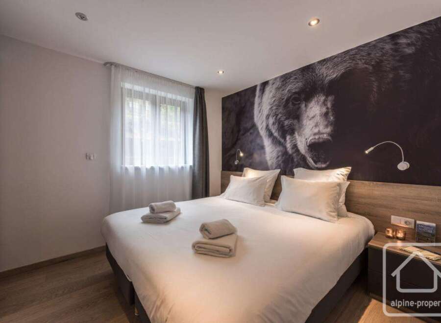 Experience luxury and comfort in this stunning bedroom.