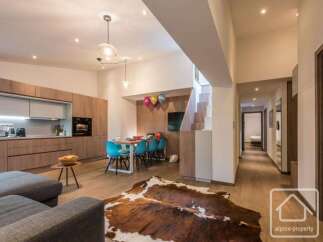 This stunning property boasts a modern open-plan living space, perfect for entertaining and family gatherings.