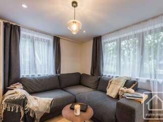 Discover the epitome of comfort and style in this inviting living space.