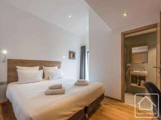 Experience the epitome of comfort in this beautifully designed bedroom.