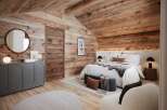 Experience the warmth and charm of this stunning bedroom, featuring exquisite wooden accents throughout.