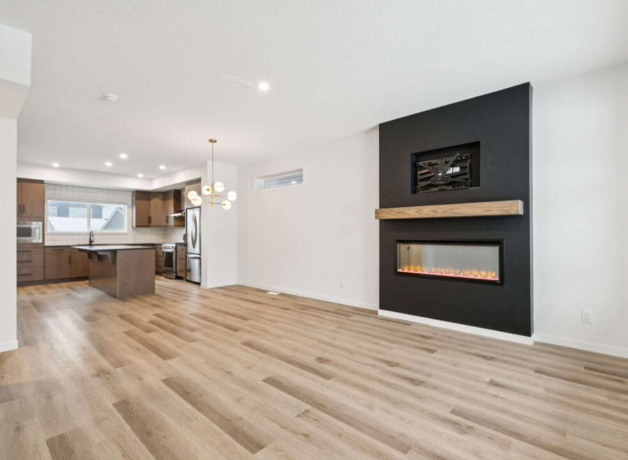 Step into modern luxury with this stunning property! Featuring a sleek, open-concept design, this home boasts beautiful hardwood floors and a cozy fireplace, perfect for relaxing evenings.