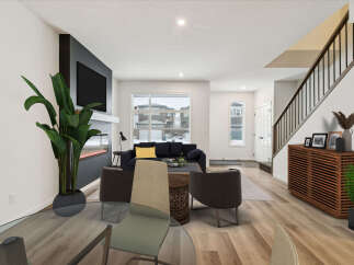 Step into modern elegance with this stunning property, showcasing a spacious living area with a cozy fireplace and a sleek, contemporary design.