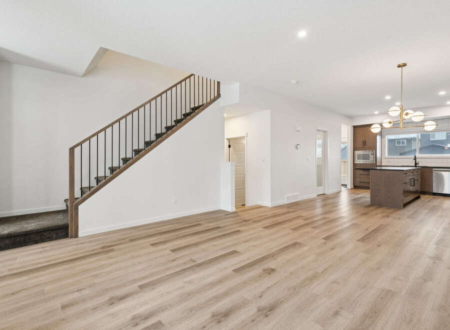 Step into modern elegance with this stunning property, featuring a spacious open-concept layout perfect for entertaining.