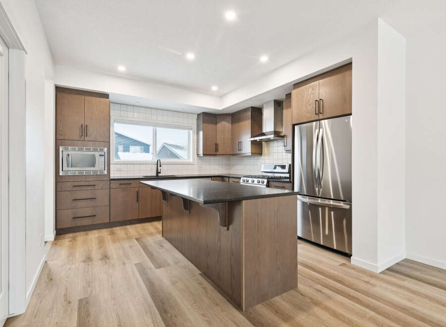 This stunning kitchen boasts modern design and functionality.