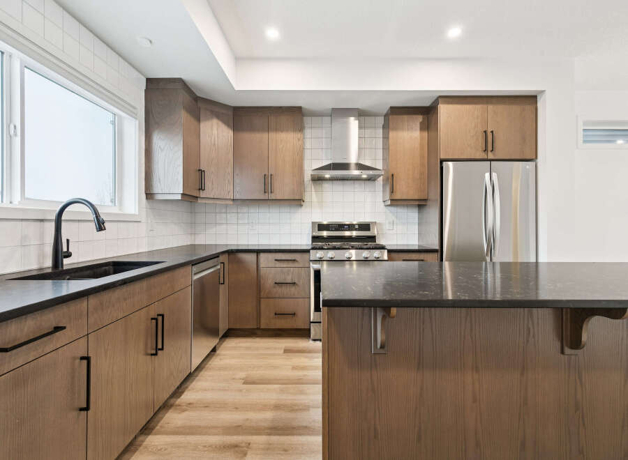 This stunning kitchen boasts modern design and functionality.