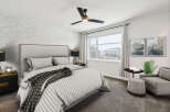 This stunning bedroom boasts a modern design with elegant touches.