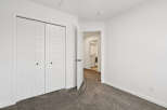 Step into this bright and airy bedroom, featuring a spacious closet and neutral color palette.