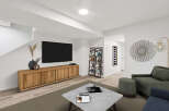 Step into modern elegance with this stunning living space.