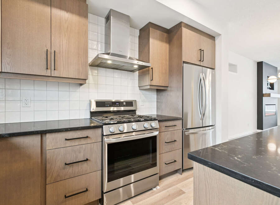 This stunning kitchen boasts modern design and high-end finishes.