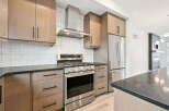 This stunning kitchen boasts modern design and high-end finishes.