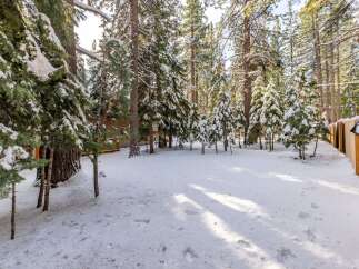 Nestled in a serene winter wonderland, this property offers a picturesque escape.