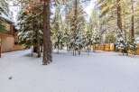 Nestled in a serene winter wonderland, this property offers a picturesque escape.