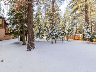 Nestled in a serene winter wonderland, this property offers a picturesque escape.