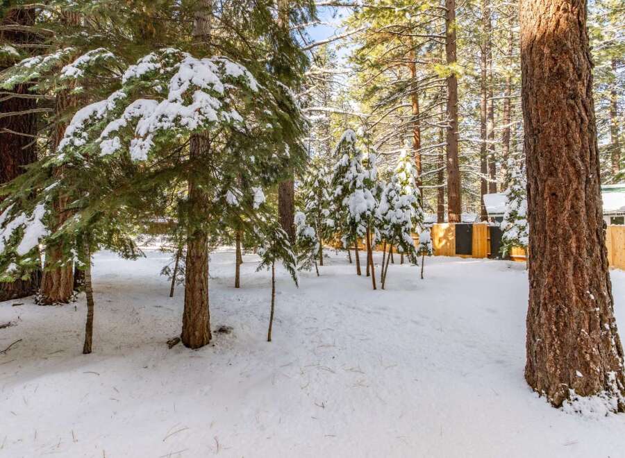 Nestled in a serene winter wonderland, this property offers a picturesque escape.