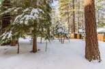 Nestled in a serene winter wonderland, this property offers a picturesque escape.