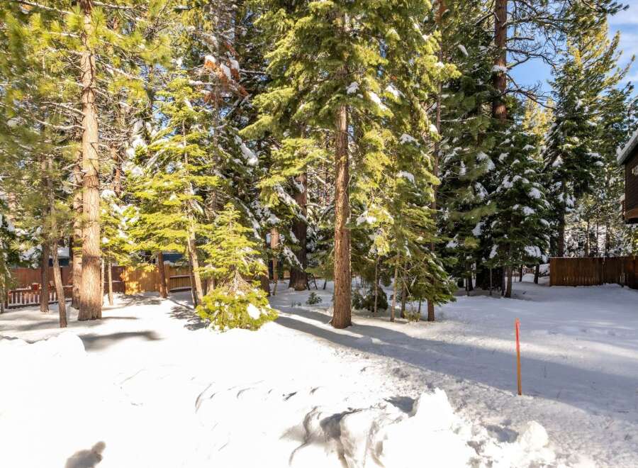 Nestled amidst a serene winter wonderland, this property offers a tranquil escape.