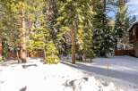Nestled amidst a serene winter wonderland, this property offers a tranquil escape.
