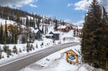 Nestled in a picturesque winter wonderland, this stunning property offers a luxurious escape.