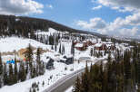 Nestled in a picturesque winter wonderland, this stunning property offers a luxurious escape.