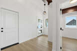 Step into this bright and airy entryway, featuring a modern design with clean lines and neutral tones.