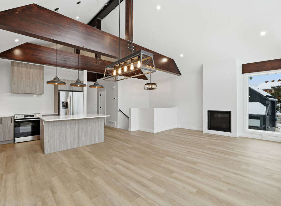 This stunning modern home boasts a spacious open-concept design, perfect for entertaining.