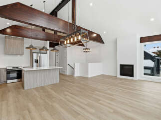 This stunning modern home boasts a spacious open-concept design, perfect for entertaining.