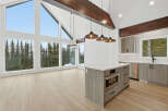 Experience luxury living in this stunning modern kitchen.