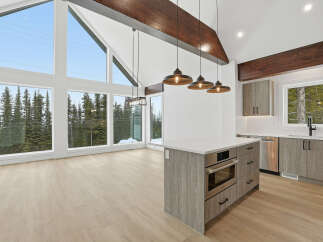 Experience luxury living in this stunning modern kitchen.