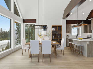 Experience luxury living in this stunning property, featuring a bright and airy dining area with expansive windows offering breathtaking views.
