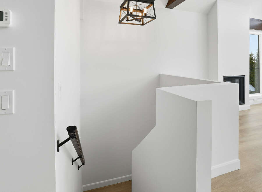 This stunning property boasts a modern interior with clean lines and a bright, airy feel.