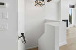 This stunning property boasts a modern interior with clean lines and a bright, airy feel.