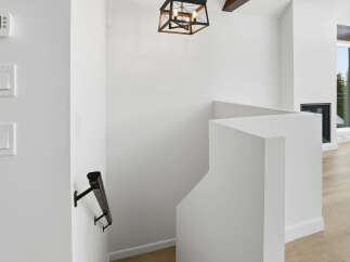 This stunning property boasts a modern interior with clean lines and a bright, airy feel.