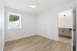 Step into this bright and airy space, featuring a modern design and neutral tones.