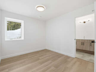 Step into this bright and airy space, featuring a modern design and neutral tones.