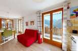 Experience the charm of this stunning property, boasting breathtaking mountain views from its expansive windows.