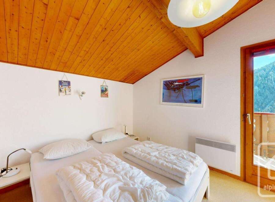 Discover a cozy bedroom retreat in this charming property.