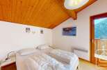 Discover a cozy bedroom retreat in this charming property.