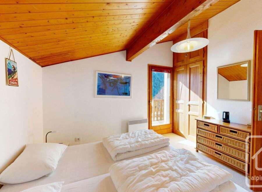 Discover the charm of this cozy bedroom, perfect for a relaxing getaway.