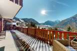Enjoy breathtaking mountain views from this charming property.