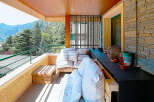 Enjoy breathtaking mountain views from this stunning balcony.