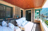 Enjoy breathtaking mountain views from this stunning outdoor space.