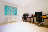 This modern office space offers a bright and airy atmosphere, perfect for productivity.